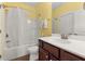 Bathroom with a shower and bath combination featuring a light vanity at 2881 Rutherford Way, Charleston, SC 29414