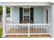 Inviting outdoor space featuring comfortable seating, a hanging flower pot, and a relaxing view at 2881 Rutherford Way, Charleston, SC 29414