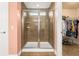 Main bathroom featuring a shower with glass door and a walk-in closet at 2881 Rutherford Way, Charleston, SC 29414
