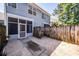 Backyard featuring a screened-in porch and a wooden privacy fence at 2947 Sweetleaf Ln, Johns Island, SC 29455