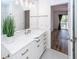 Bright bathroom with a white vanity, modern fixtures, and a view into the bedroom at 2947 Sweetleaf Ln, Johns Island, SC 29455