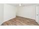 Simple bedroom featuring wood floors, neutral walls, and a ceiling fan at 2947 Sweetleaf Ln, Johns Island, SC 29455