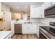 Modern kitchen with stainless steel appliances, white subway tile backsplash, and stone countertops at 2947 Sweetleaf Ln, Johns Island, SC 29455