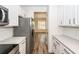 Bright and modern kitchen featuring stainless steel appliances, white cabinets, and subway tile backsplash at 2947 Sweetleaf Ln, Johns Island, SC 29455