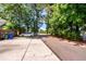 A wide shot of the neighborhood with a car parked in the driveway at 2947 Sweetleaf Ln, Johns Island, SC 29455