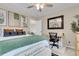 Serene bedroom with stylish accents, a home sweet home pillow, and dedicated workspace at 2961 Waterleaf Rd, Johns Island, SC 29455