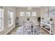 Bright dining room featuring a modern table, stylish decor, and plenty of natural light at 2961 Waterleaf Rd, Johns Island, SC 29455