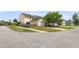 Charming yellow two-story home with a detached garage and well-maintained landscaping at 2961 Waterleaf Rd, Johns Island, SC 29455