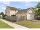 Charming home featuring a detached one car garage and a fenced yard at 2961 Waterleaf Rd, Johns Island, SC 29455