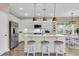 Modern kitchen with stainless steel appliances, pendant lighting, and a spacious island with seating at 2961 Waterleaf Rd, Johns Island, SC 29455
