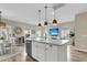 Spacious kitchen island with seating, open to the living area, perfect for entertaining and casual dining at 2961 Waterleaf Rd, Johns Island, SC 29455