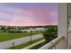 Enjoy stunning sunsets over the lake from this home's balcony view at 2961 Waterleaf Rd, Johns Island, SC 29455
