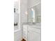 Stylish bathroom featuring a vanity with a modern sink, white cabinets, and shiplap accents at 308 Archar St, Summerville, SC 29486