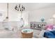 Bright bonus room with hanging chairs, unique decor, and comfortable seating at 308 Archar St, Summerville, SC 29486