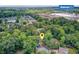 Overhead view of a secluded home surrounded by lush trees, near a Walmart store and other residences at 309 Kingbird Rd, Ladson, SC 29456