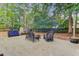 Relaxing backyard patio with outdoor seating and a storage shed at 309 Kingbird Rd, Ladson, SC 29456