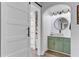 Stylish bathroom with modern vanity, sleek lighting, and shiplap details that add character at 309 Kingbird Rd, Ladson, SC 29456
