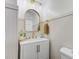Beautifully designed bathroom with a modern vanity, stylish mirror, and elegant fixtures at 309 Kingbird Rd, Ladson, SC 29456