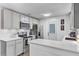 Modern kitchen with stainless steel appliances and bright countertops at 309 Kingbird Rd, Ladson, SC 29456