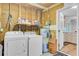 Functional laundry area with washer, dryer, and water heater at 309 Kingbird Rd, Ladson, SC 29456