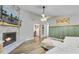 Comfortable living room featuring a stone fireplace and an open layout at 309 Kingbird Rd, Ladson, SC 29456