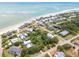An aerial view of a beachfront community with beach access and beautiful landscaping at 3109 Ion Ave, Sullivans Island, SC 29482