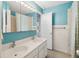Bathroom featuring a double sink vanity, decorative tile floor, and a tub/shower combo at 3109 Ion Ave, Sullivans Island, SC 29482