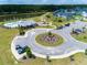 Aerial view of community pool, playground, clubhouse, and parking amenities at 311 Beachgrass Ln, Summerville, SC 29486