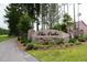 Stone entrance to The Oaks community surrounded by trees and lush landscaping at 311 Beachgrass Ln, Summerville, SC 29486