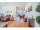 Comfortable living room with wood floors, furnishings, and decor for casual relaxation and a welcoming atmosphere at 311 Beachgrass Ln, Summerville, SC 29486