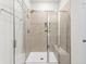 Luxurious tiled shower featuring a glass enclosure and built-in bench offers a spa-like experience at 327 Calm Water Way, Summerville, SC 29486