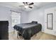 Clean bedroom with neutral carpet, ceiling fan, and natural light at 327 Eagle Ridge Rd, Summerville, SC 29485