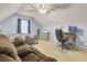 Bonus room with comfortable seating, study area, and carpeting at 327 Eagle Ridge Rd, Summerville, SC 29485