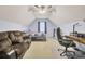 Bonus room with comfortable seating, study area, and carpeting at 327 Eagle Ridge Rd, Summerville, SC 29485