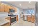 Spacious kitchen features stainless steel appliances, granite countertops, and a breakfast bar at 327 Eagle Ridge Rd, Summerville, SC 29485