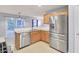 Open concept kitchen with stainless appliances, granite counters, and breakfast bar at 327 Eagle Ridge Rd, Summerville, SC 29485