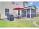 Exterior of a home featuring a stone patio with seating and grill at 327 Eagle Ridge Rd, Summerville, SC 29485