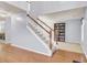 Spacious foyer with staircase, wood floors, and bookshelf at 327 Eagle Ridge Rd, Summerville, SC 29485