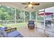 Bright sunroom with tiled floors, ceiling fan, and comfortable seating, a serene retreat at 327 Eagle Ridge Rd, Summerville, SC 29485