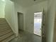 Entryway and stairs with unfinished floors at 333 Trailmore Ln, Summerville, SC 29486