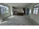 Bright living room and kitchen area with sliding glass doors to the backyard at 333 Trailmore Ln, Summerville, SC 29486