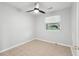 Bright bedroom with tiled floor, ceiling fan, and large window offering plenty of natural light at 40 Elmwood Pl, Goose Creek, SC 29445