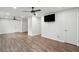 Spacious living room boasts modern ceiling fans and stylish wood-look flooring throughout at 40 Elmwood Pl, Goose Creek, SC 29445