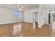 Bright living room featuring hardwood floors, a ceiling fan, and natural light from a large window at 423 Watershed Dr, Goose Creek, SC 29445