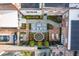 Overhead view of the landscaped backyard with patio, water feature, and seating, offering a tranquil outdoor space at 43 Hasell St, Charleston, SC 29401