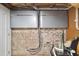 This basement has a dual modern Enphase energy system installed on a brick wall at 43 Hasell St, Charleston, SC 29401