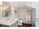 Stylish bathroom featuring a vanity, a shower with glass door, and a neutral color scheme at 43 Hasell St, Charleston, SC 29401