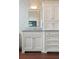 Chic bathroom vanity with marble countertop, ample storage, and elegant wall mirror at 43 Hasell St, Charleston, SC 29401