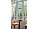 Charming dining area with natural light streaming in from large windows with outdoor view at 43 Hasell St, Charleston, SC 29401