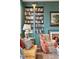 Living room featuring built-in bookshelves, fireplace, and comfortable seating at 43 Hasell St, Charleston, SC 29401